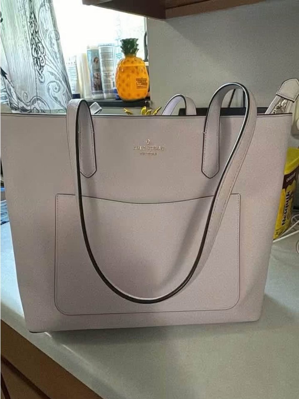 kate spade pale pink structured tote with front pocket